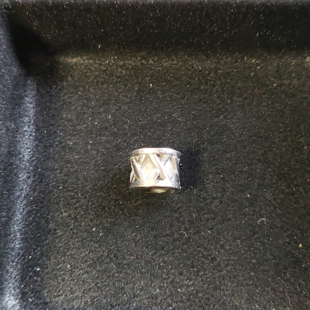 Chamilia xxx"s Sterling silver charm